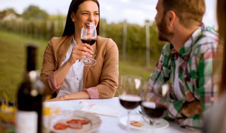 Best Western Garden Inn | Santa Rosa, California | Woman sipping red wine with friend