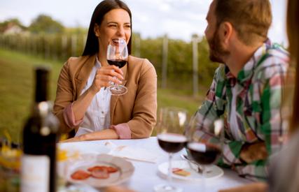 Best Western Garden Inn | Santa Rosa, California | Woman sipping red wine with friend